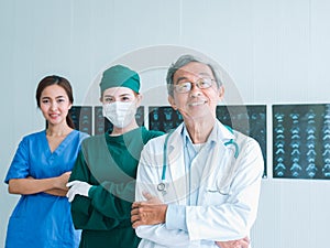 Senior Doctor and Team with nurse and female doctor Surgeon portrait in office at hospital.