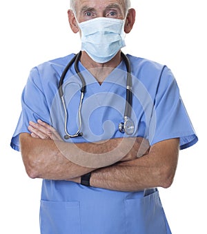 Senior doctor wearing mask and scrubs