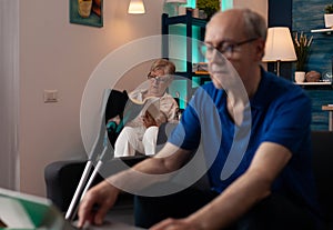 Senior elderly people enjoying retirement in living room