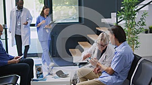 Senior endocrinologist examining patient