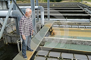 Senior engineer controlling quality water