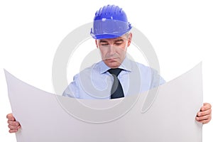 Senior engineer holding a spread project