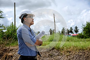 Senior engineer look at constructed area