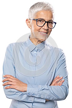 Senior expert! Businesswoman with glasses in a blue shirt and gray white hair and glasses. Isolated on white