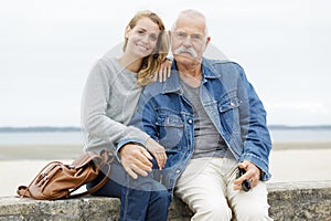 senior father and daughter at sea