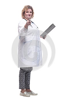senior female doctor with clipboard. isolated on a white
