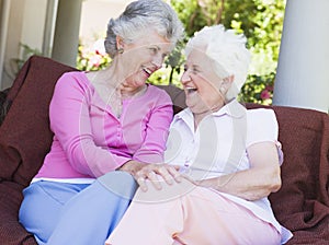 Senior female friends chatting together