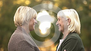 Senior female friends happy to see each other after many years, friendship