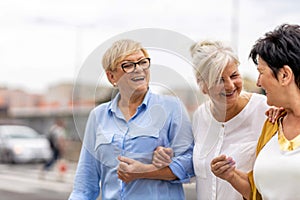 Senior female friends having good time together