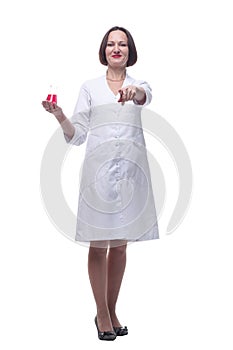 senior female medic with a laboratory bottle. isolated on a white background.