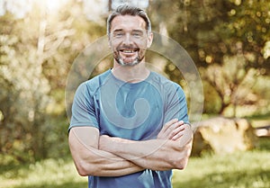 Senior, fitness and portrait of man with arms crossed in a park happy with workout, running or results. Exercise, face