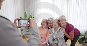 Senior fitness, women and person with a photo for a yoga, exercise or workout memory together. Smile, group and coach