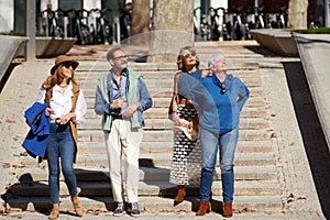 Senior Friends Enjoying a Leisurely Stroll Through the City photo