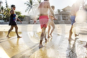 Senior friends having fun at the beach