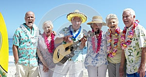 Senior friends playing guitar