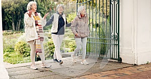 Senior friends, walking and talking together on an outdoor path to relax in nature with elderly women in retirement