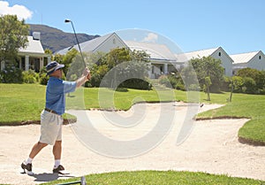 Senior golfer playing golf