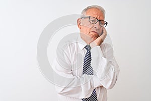 Senior grey-haired businessman wearing tie and glasses over isolated white background thinking looking tired and bored with