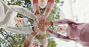 Senior, group and hands together with unity for support with low angle, happy or celebration in nature. Elderly, women