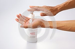 Senior Hand Applying Lotion