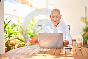 Senior handsome man smiling happy and confident