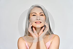 Senior happy middle aged mature asian woman headshot portrait. Skin care advertising.