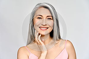 Senior happy middle aged mature asian woman portrait. Skin care advertising.