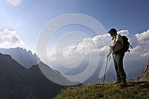 Senior hiker enjoying amazing landscape of the Alp