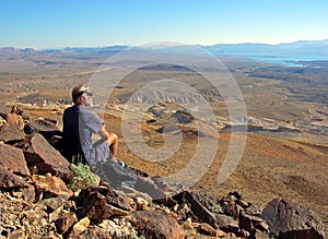 Senior hiker enjoying view of Lake Mead, Nevada.