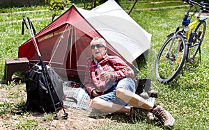 Senior hiker resting