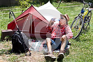 Senior hiker resting