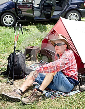 Senior hiker resting