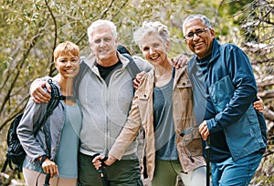 Senior hiking group, portrait and smile in nature, forest and happy for adventure together in summer. Friends, woods and