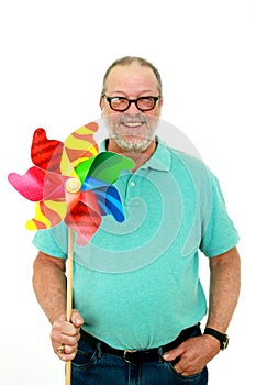 Senior holding a pinwheel