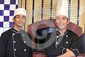 Senior and junior chef