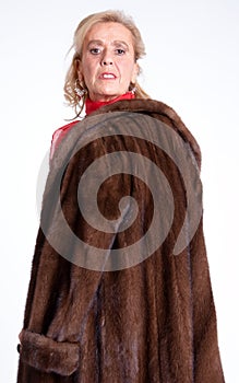 Senior lady with mink coat i