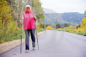 Senior lady nordic walking