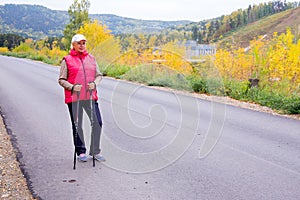 Senior lady nordic walking