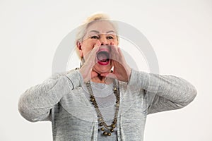 Senior lady shouting.