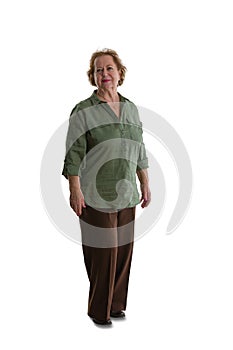 Senior lady standing against white background