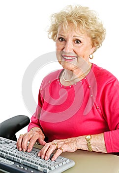 Senior Lady Using Desktop Computer