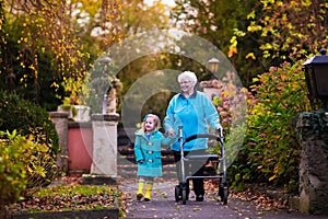 Senior lady with walker enjoying family visit