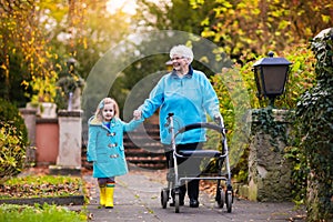 Senior lady with walker enjoying family visit