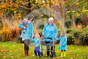 Senior lady with walker enjoying family visit