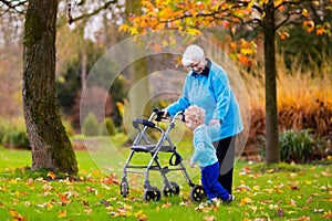 Senior lady with walker enjoying family visit