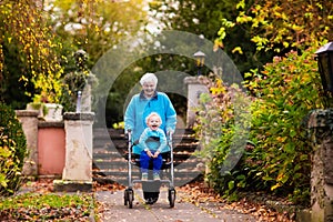 Senior lady with walker enjoying family visit