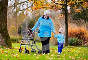 Senior lady with walker enjoying family visit