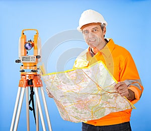 Senior land surveyor with theodolite