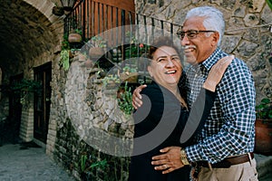 Senior Latino Mexican couple in love celebrates their anniversary