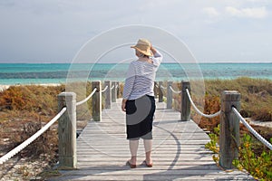 Senior looks out on ocean